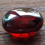 KG-106 Oval Scarlet Red NAGA EYE or Manee Naka, Phraya Nak, Naga Cave Crystal Thai-Laos talisman Magic Power of wealth Buddha Amulet 